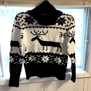 Gorgeous winter/ holiday sweater by DOLCE & GABBANA. White and black in color XS
